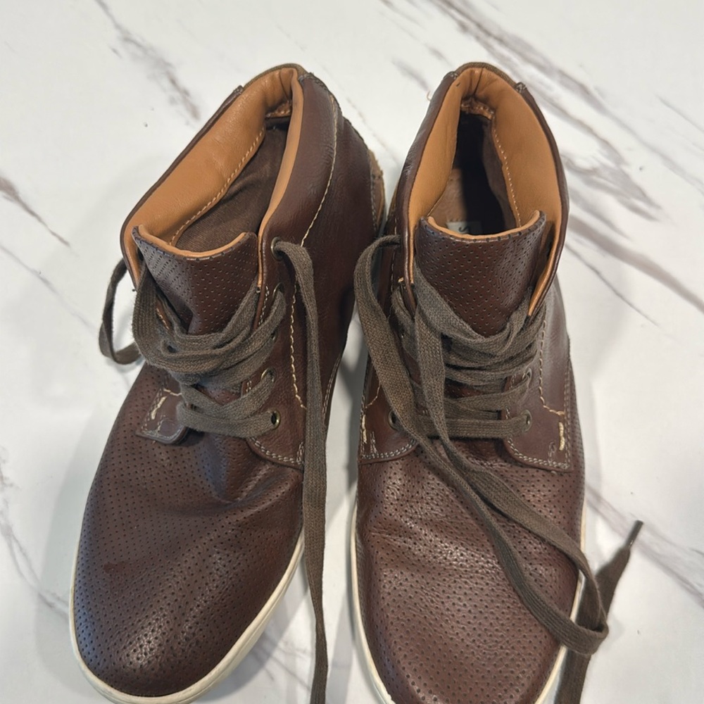 Steve Madden 
Size 7 
Brown boots 
Work maybe 5 times